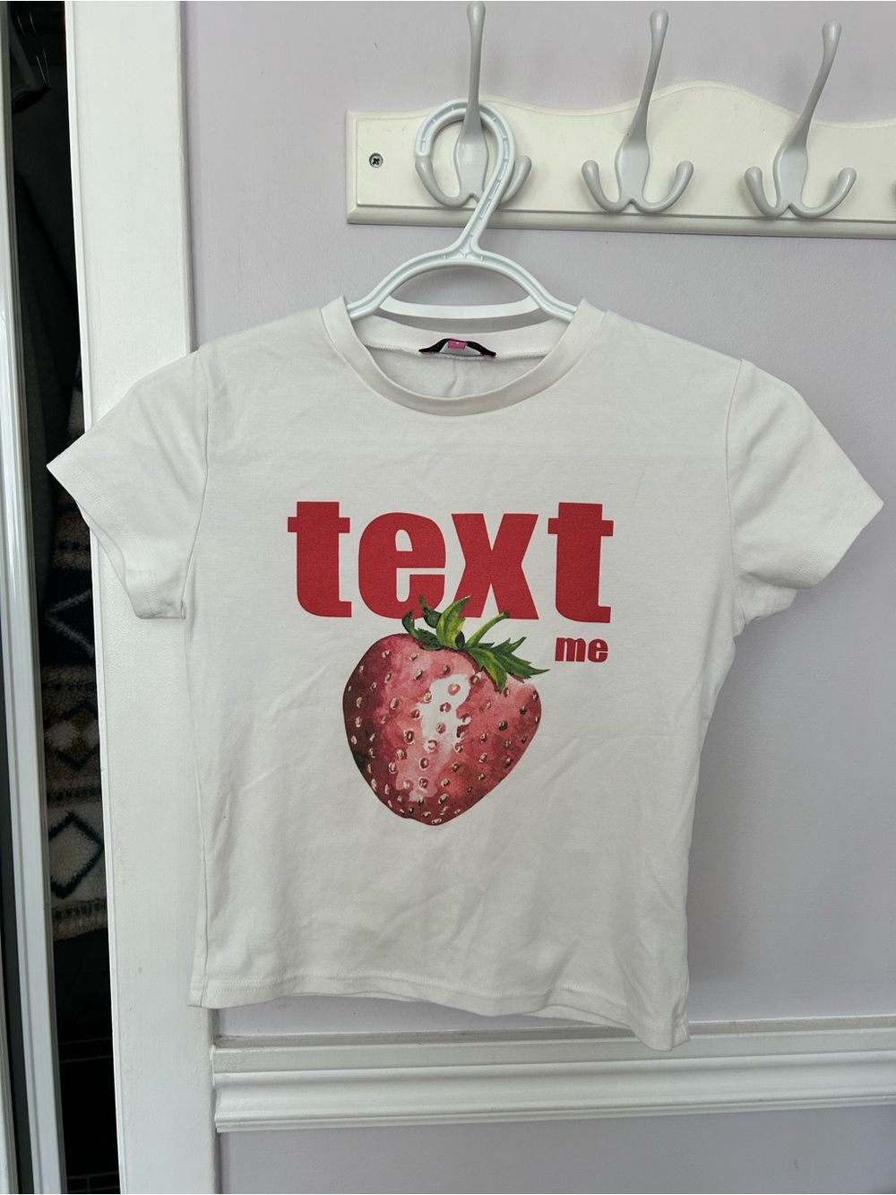 Edikted White Tee with Red "text me" and Strawberry Graphic